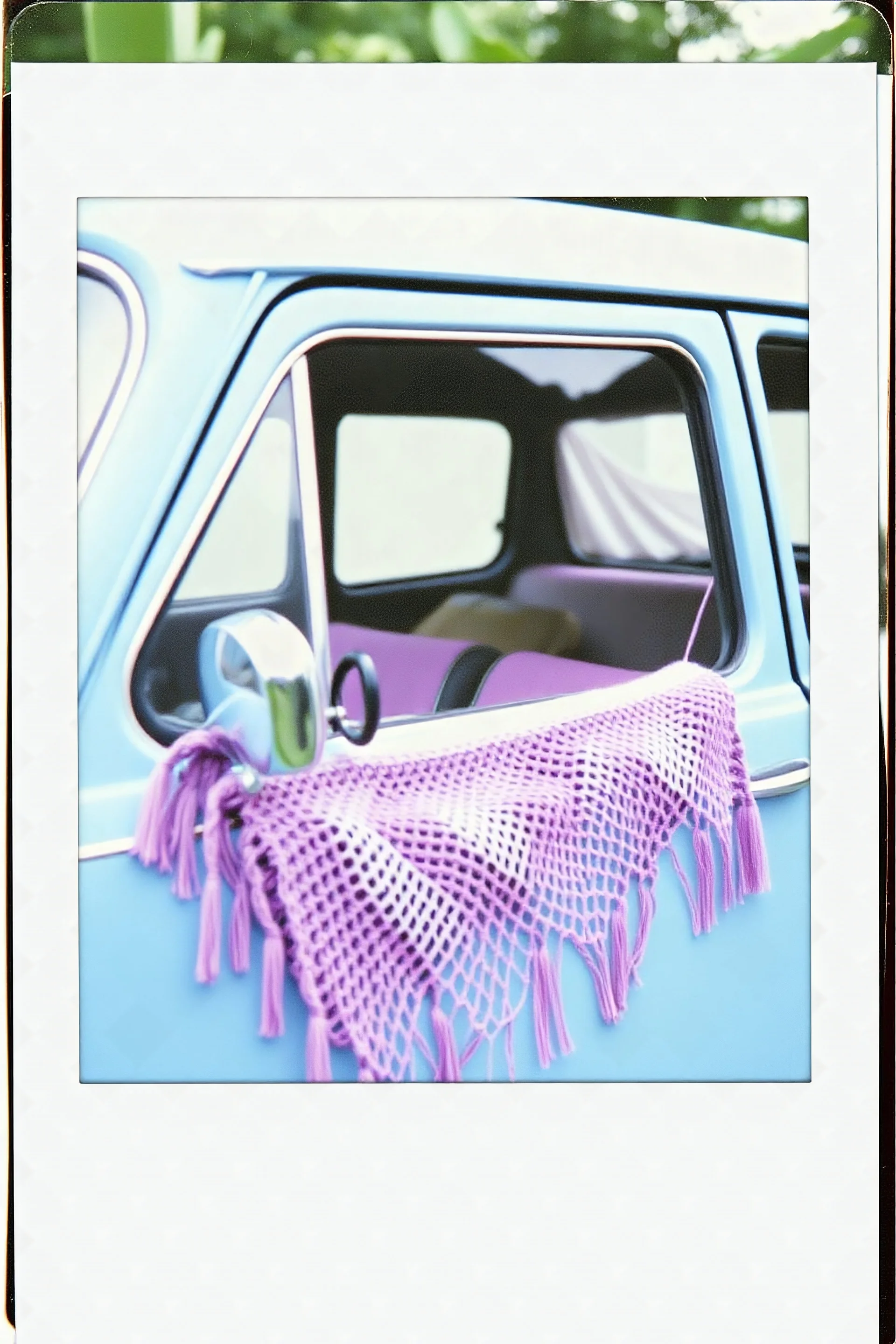 Vintage polaroid of a hippie car,crochet, purple