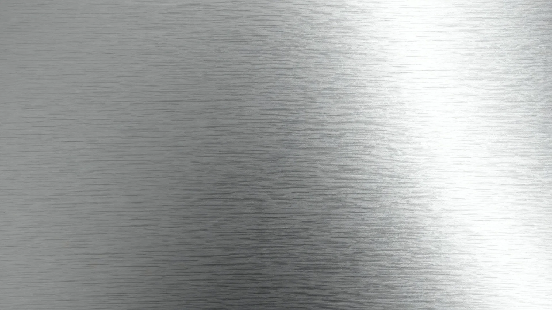 brushed stainless Steel Texture, with a light source reflecting at an angle