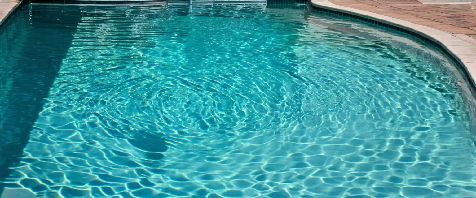 the rippled surface of the water in a pool, just the watter