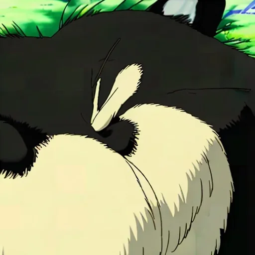 Portrait of a fluffy tuxedo cat sitting near a black cat with yellow eyes