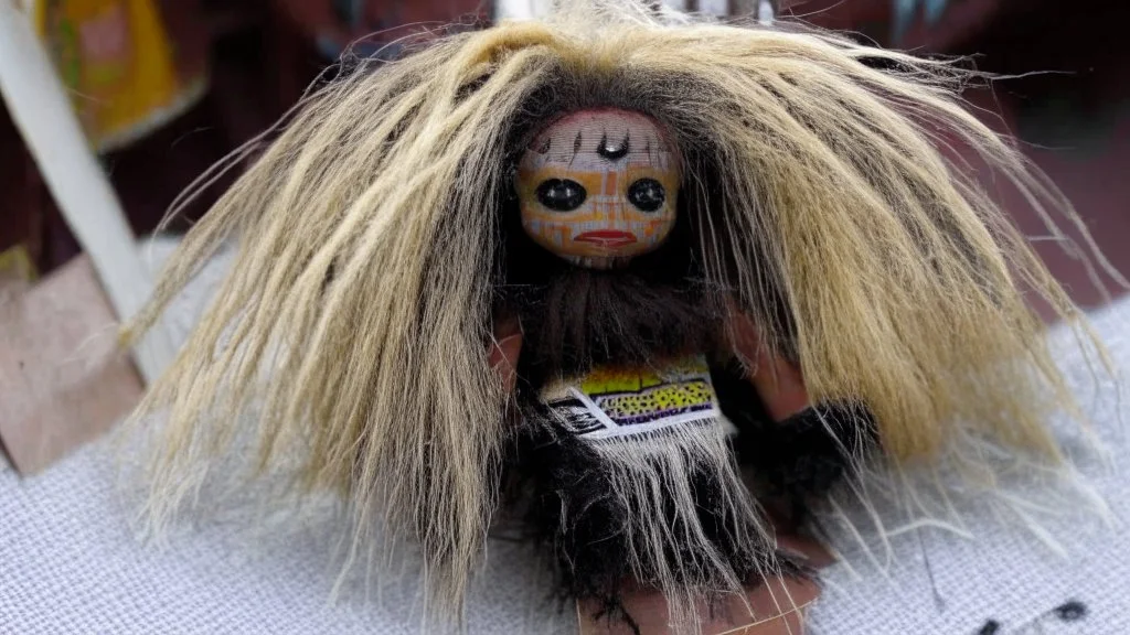 ritual doll made of hair from the floor of a barbershop