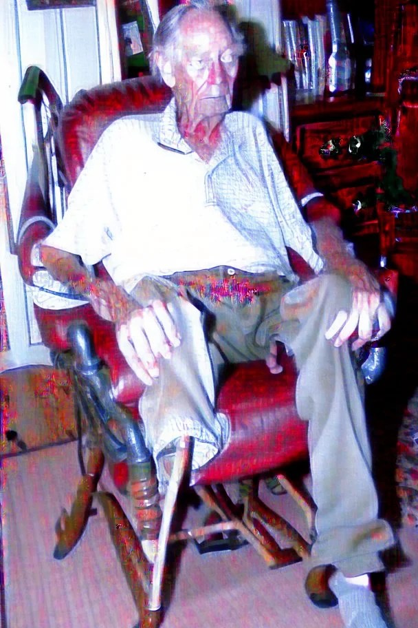 Uncle Roger put leg down from chair.