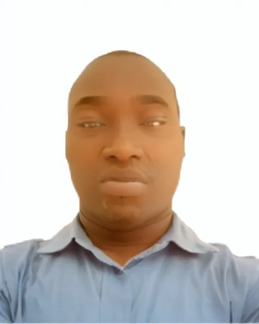 passport picture of black man with a brown shirt and hidden facial mark