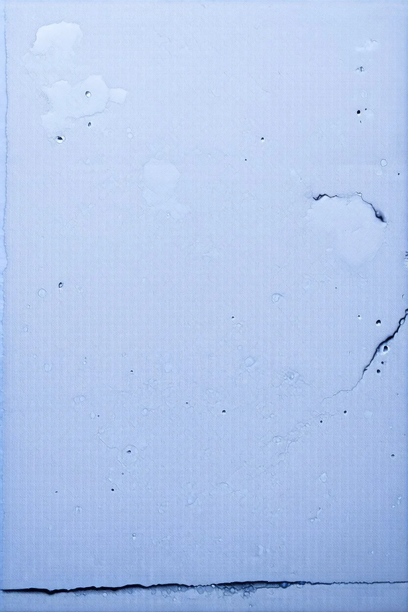 textured paper background with water stains across bottom