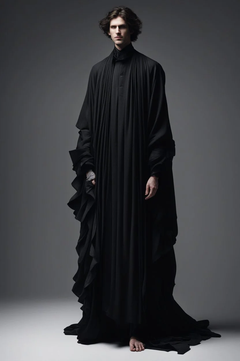 Он носит одежды из темных, струящихся тканей