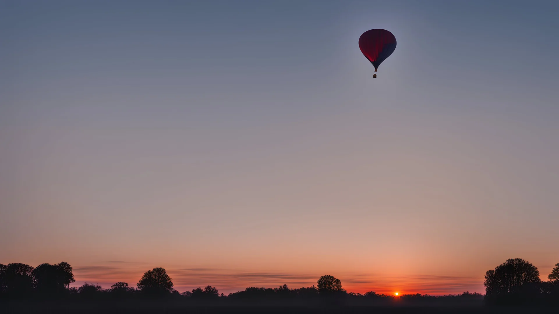 Balloon before sunrise