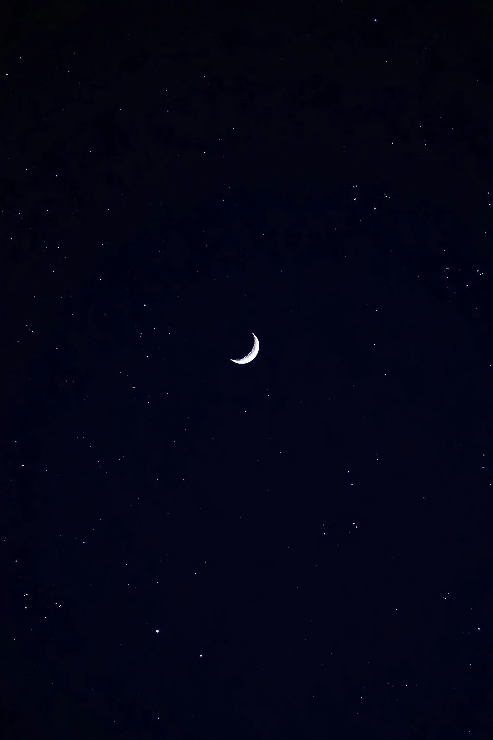 A dark night sky in blue, with white speckled stars and a crescent moon outlined in black
