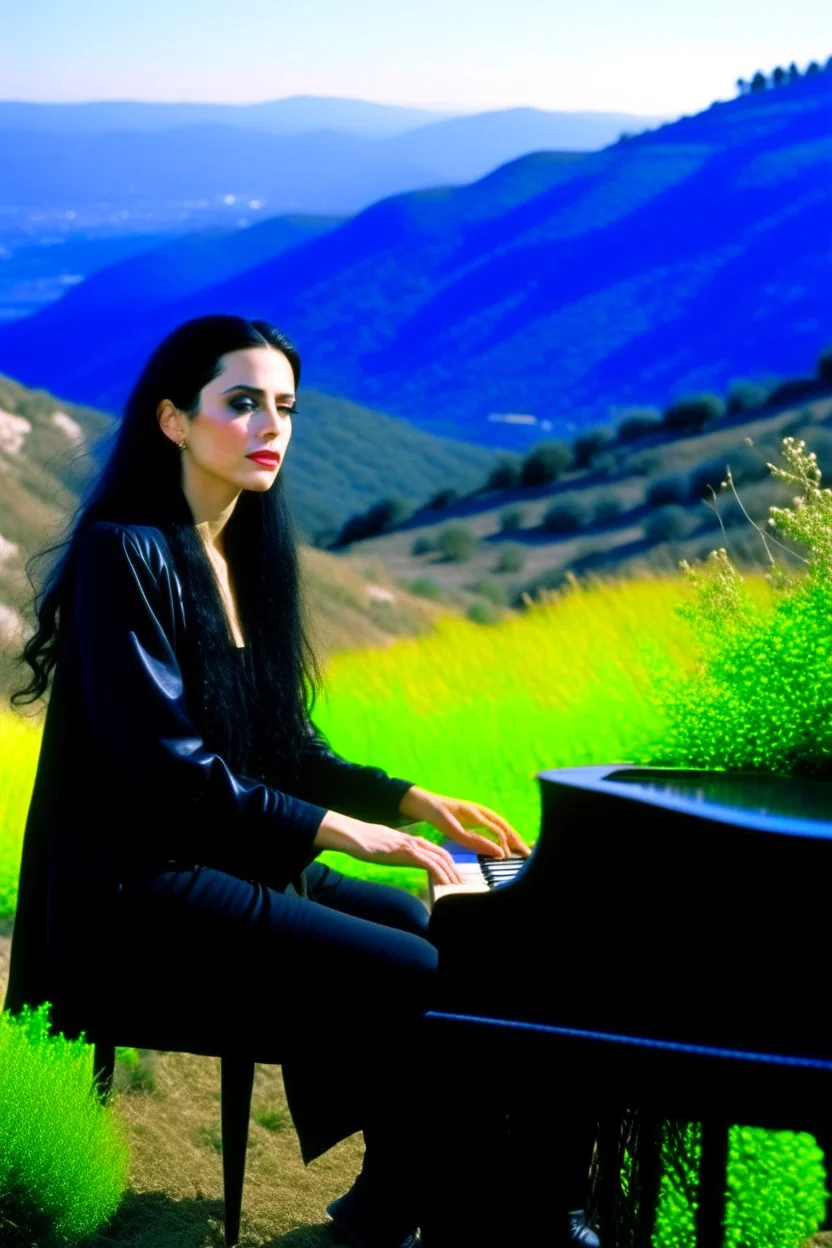 Diamanda Galas playing piano on a hillside