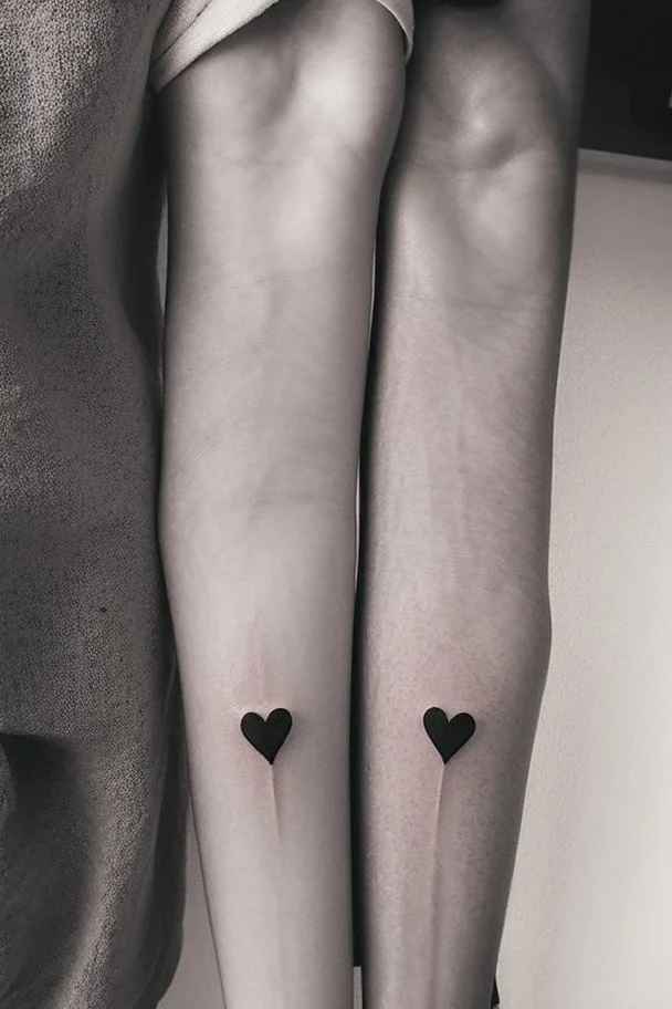 Small tattoos for a couple express eternal love Photorealistic