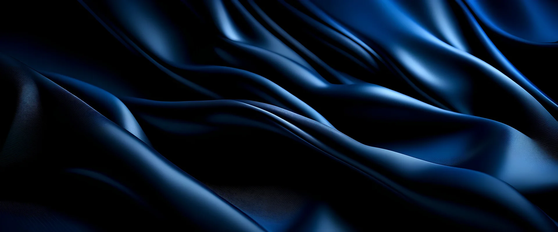 Abstract dark blue background. Silk satin. Navy blue color. Elegant background with space for design. Soft wavy folds.