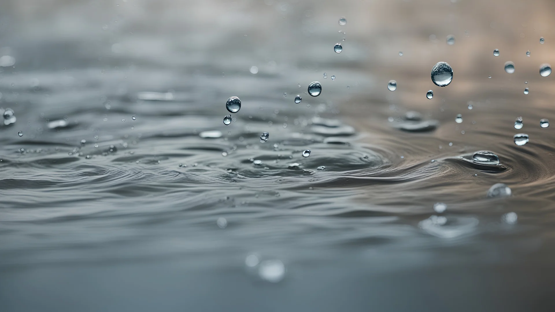 water drops fall into water