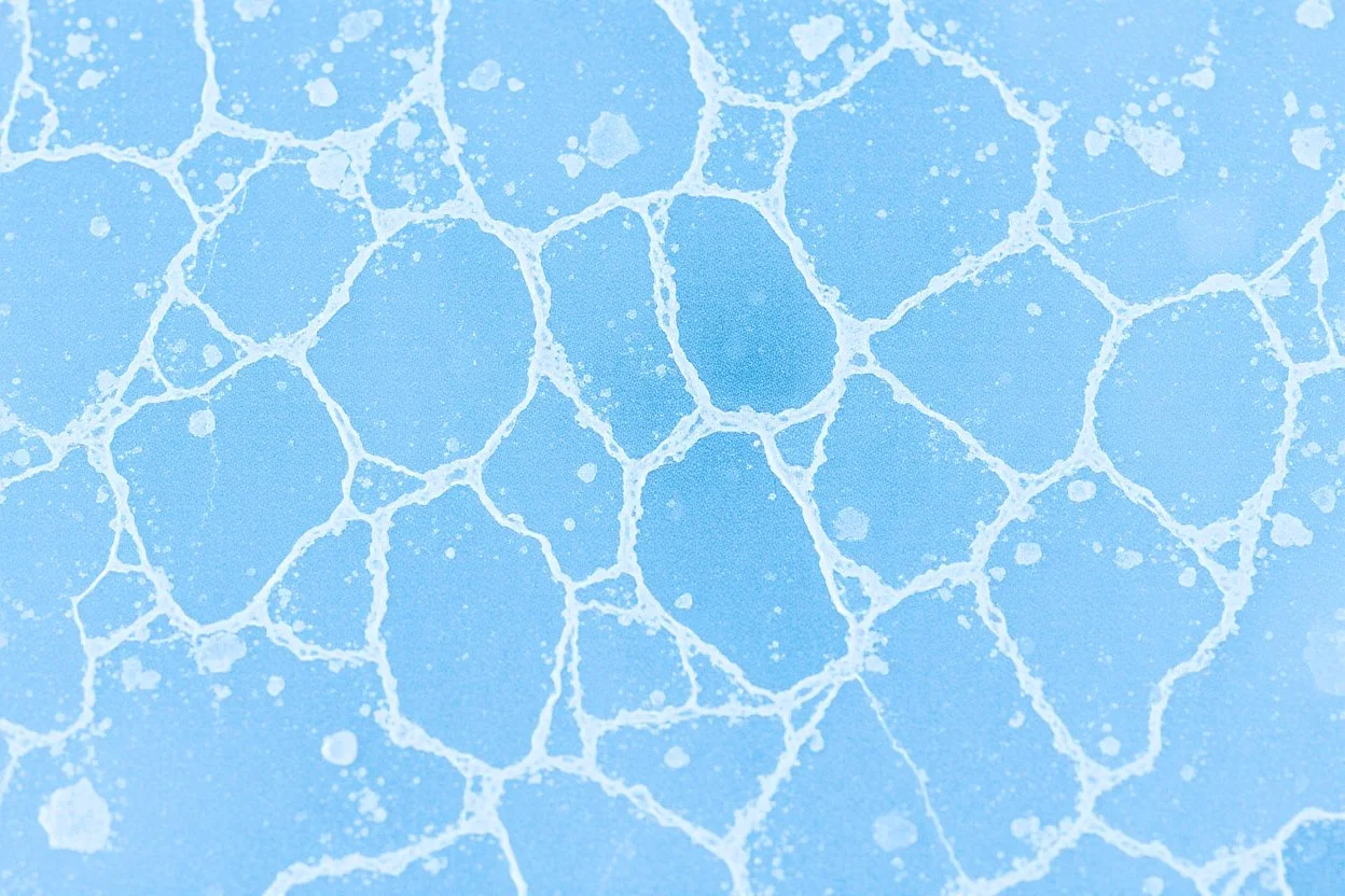 ice forming texture, white on blue