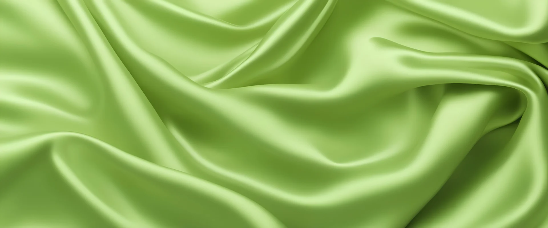 Yellow green silk satin. Lime color shiny silky smooth fabric. Soft wavy folds. Elegant background with space for design. Bright. Light. Banner. Flat lay, top view table. Template.