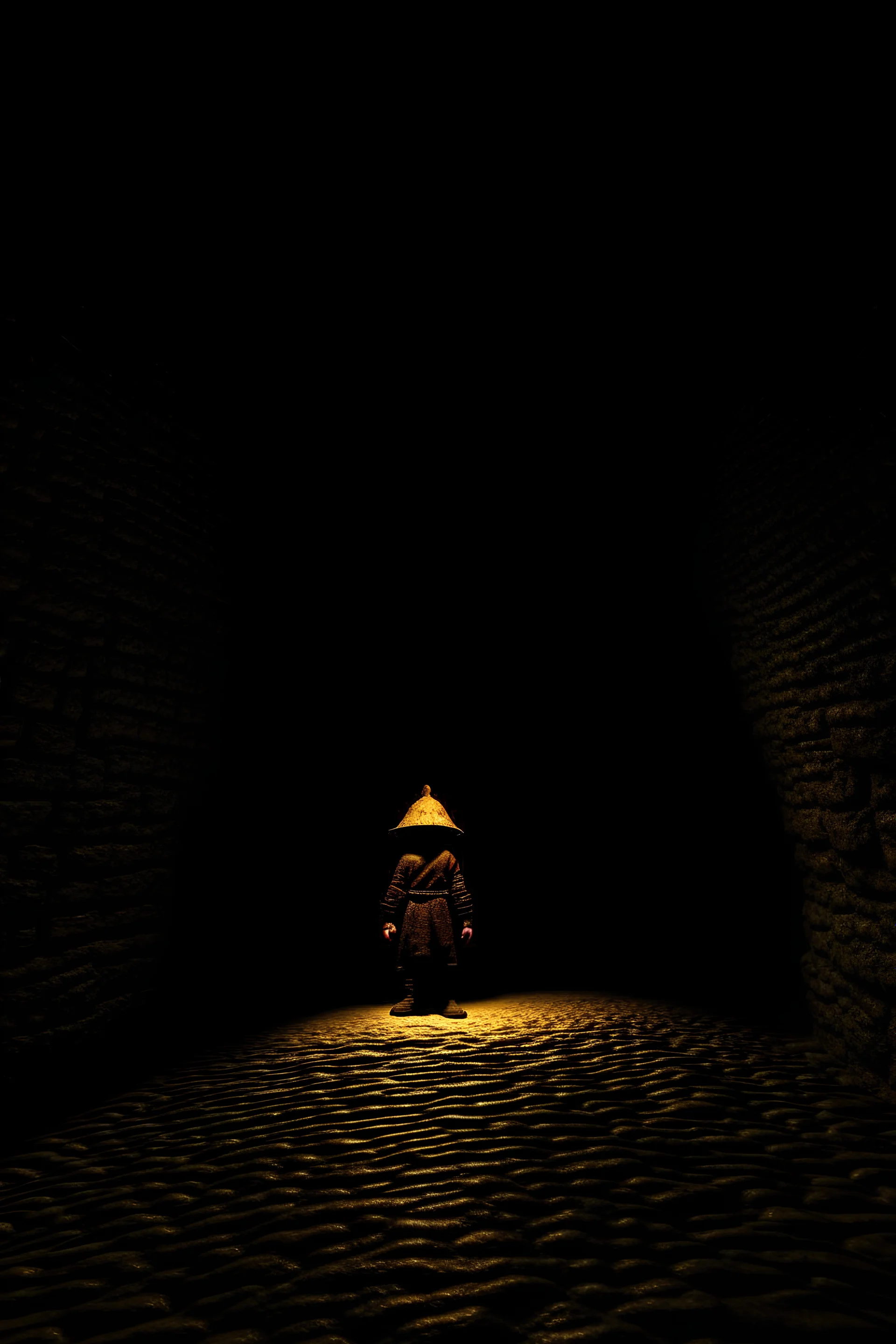 character in semi-darkness, on the scree cone of an underground room dimly lit by daylight coming from a well located forty meters above.