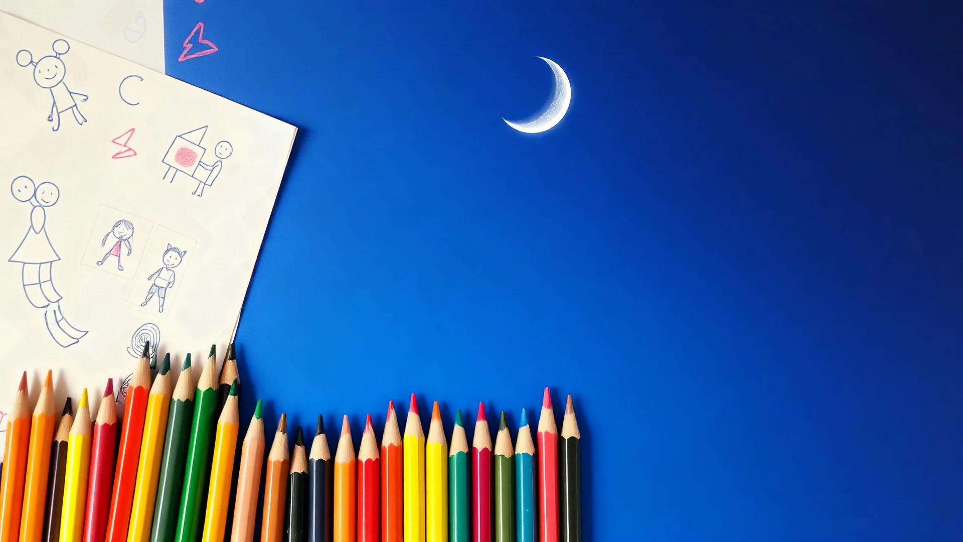 A bunch of colored pencils and some children's drawings on the wall and the image of the crescent moon above the image on a light and dark blue background, amazing, poetic and special.