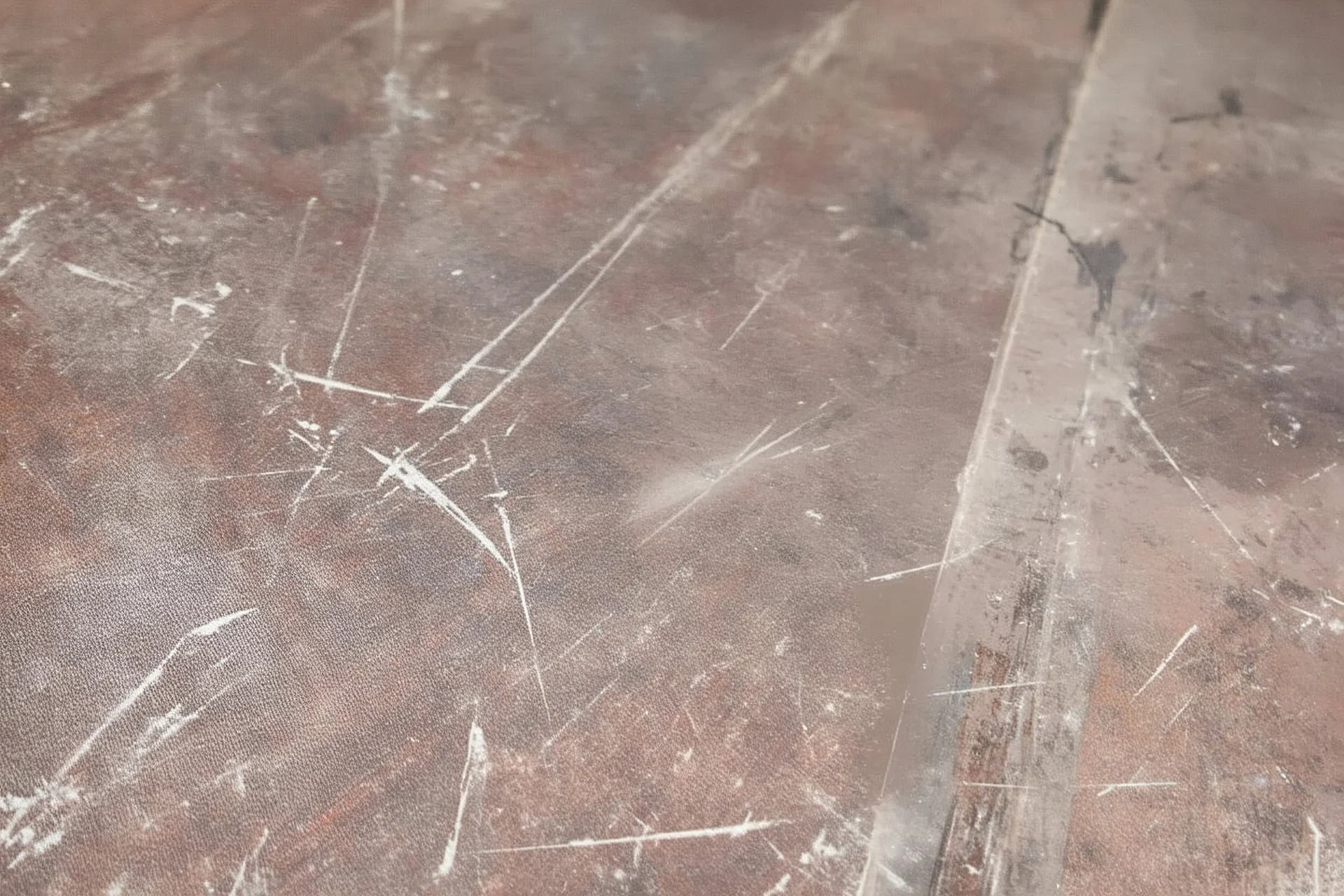 scratched garage floor, low angle