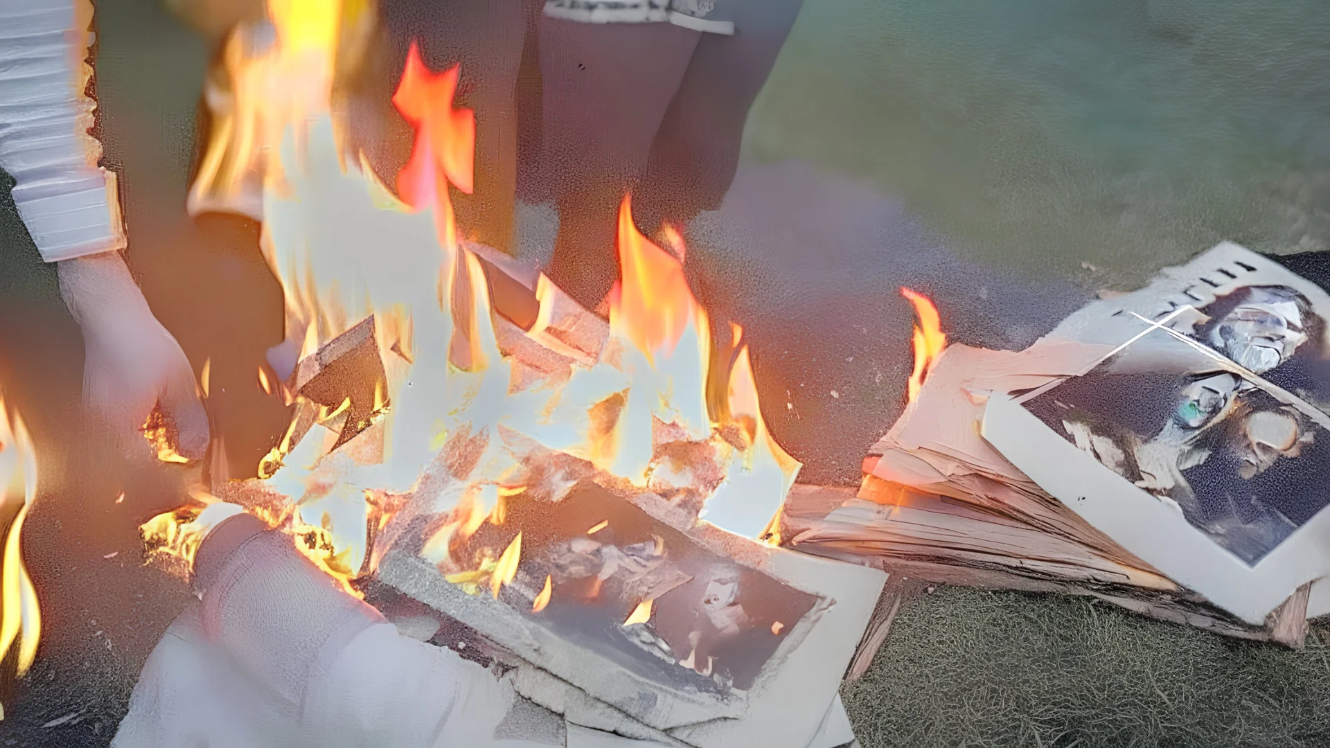 delivery driver burns old antique photos in summoning ritual fire