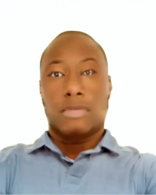 passport picture of black man with a brown shirt and hidden facial mark