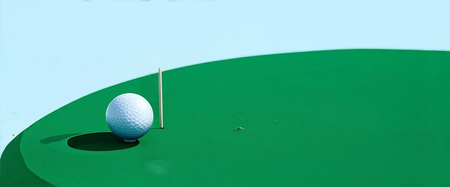 golf ball with shadow next to golf hole, golf green grass, short green grass, clear blue sky, add textures, photo realism