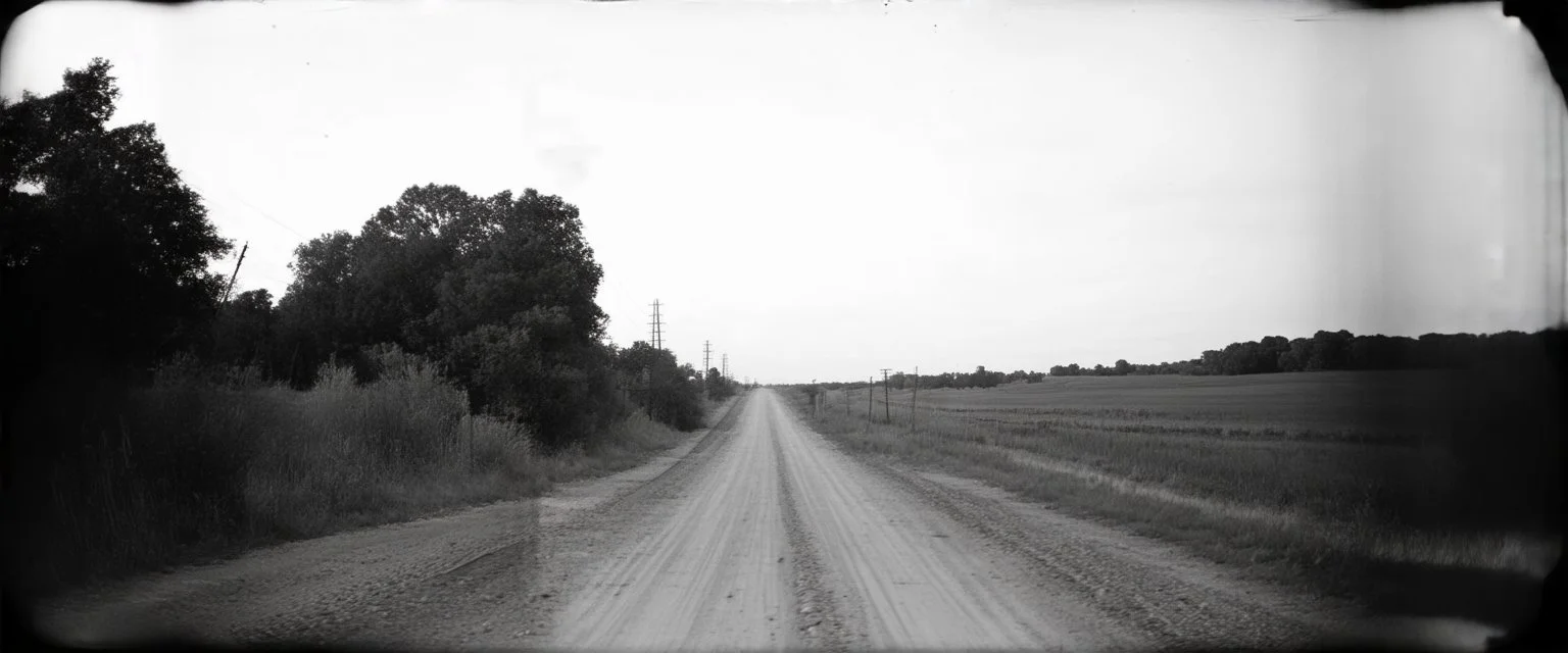old wester railroad a dirt road , grayscale, antique pinhole photo
