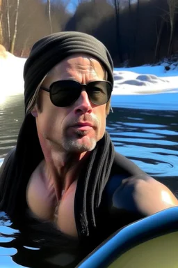 brad pitt bathing in a frozen lake with swimming glasses on