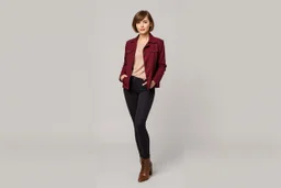 beautiful lady with short hair ,classic jacket and panta stand full body pose pretty boots ,simple background