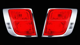 2 vehicle taillight(with chrome trim) on black background, add details and inner glow