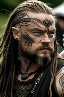 leo dicaprio as long haired celtic warrior with tribal tattoos