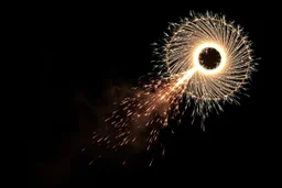 dark background. rotating circle of energy(bottom and right) giving off sparks, smoke trail across(bottom and then up left)