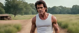 Best quality best resolution cinematic shot 1080p 4k photo of Dean Kamen wearing jean shorts and white tank top muscle tee with a mullet haircut alone , Deep South, country, farm
