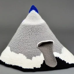 Model of the Matterhorn made of wool knitting, grey and white