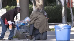 dirty homeless man selling his groceries to strangers