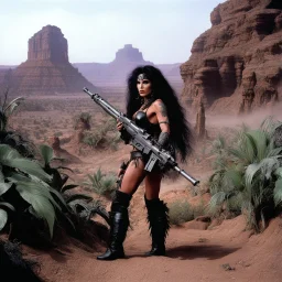 tattooed Julie Strain in action, standing in the middle of the badlands jungle surrounded by luxuriant flora - Heavy Metal F.A.K.K.2 her machine-gun in hand (shot from The Dark Crystal, 1982 dark fantasy film directed by Jim Henson and Frank Oz)