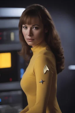 20-year-old Mina Shatner as Captain Jamesa T. Kirk, wearing a yellow, thigh length, long-sleeved, slit mini-dress with a plunging neckline and an upside-down, V-shaped Starfleet communication badge on the left chest, Physician's rank on the collar and sleeve cuffs
