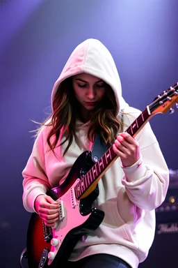 attractive woman wearing a hoodie and playing an electric guitar
