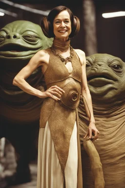 Liz Carr in princess Leia's slave costume of the Return of the Jedi, close to Jabba the Hutt.