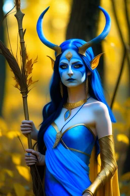 A picture of a beautiful blue faced indian goddess with skin painted blue, blue painted body, blue painted torso, wild black hair, stag antlers, elven ears, golden skirt, holding a staff in a sunny forrest