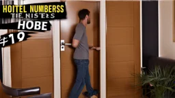 guy tastes the numbers on his hotel room door