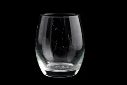 Slightly cracked glass, black background