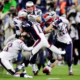 Tom Brady tackling a kid