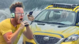 guy in hurricane arguing on cellphone next to his half lemon half kia sportage