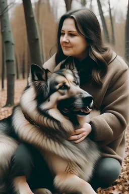 a lady with a dog bigger than her self