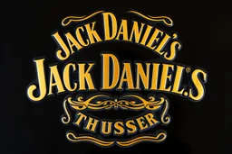 a Jack Daniels style graphic element made of brass