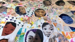 Print your portrait onto fabric and cut it into small pieces. Provide visitors with fabric markers, encouraging them to add their own messages of triumph and encouragement onto the fabric pieces. Then, reassemble the fabric pieces into a collaborative textile collage that visually represents collective strength and support.