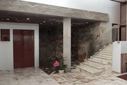 generate an interior pateo with swimming pool and an environment in Portuguese pink marble