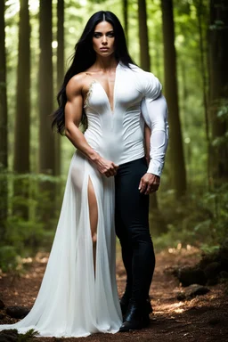 muscular alpha male standing beside a young woman with long black hair wearing a long white dress standing in a forest