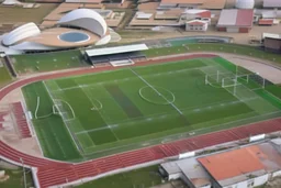 Cândido de Oliveira" Football Stadium, an aerial photograph taken by a drone in a futuristic landscape in an abandoned Alentejo village with white neon light, Shot on Canon EOS R5, 50mm lens, depth of field, shutter speed 1/ 1000, f/ 2. 8, white balance, 6000k. High resolution, realistic details, HDR efects, film grain, 4K. –ar 16: 10 –