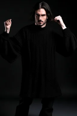 Man's large and long and black knitted Poliedric jumper and bell shape sleeves