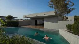 This image showcases a modern architectural style house with a minimalist design. The layout features clean, angular lines and a flat roof. The exterior walls are made of light-colored concrete, and there are three small square windows on the left side. The house has a large open space that leads to a pool with clear blue water in the foreground, where a few people are swimming and enjoying themselves. The pool area is surrounded by a concrete wall on the right. The sky is partly cloudy, adding