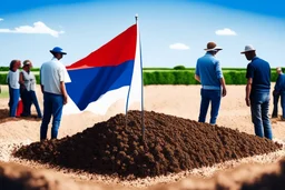 French flag near people talking about soil strategy